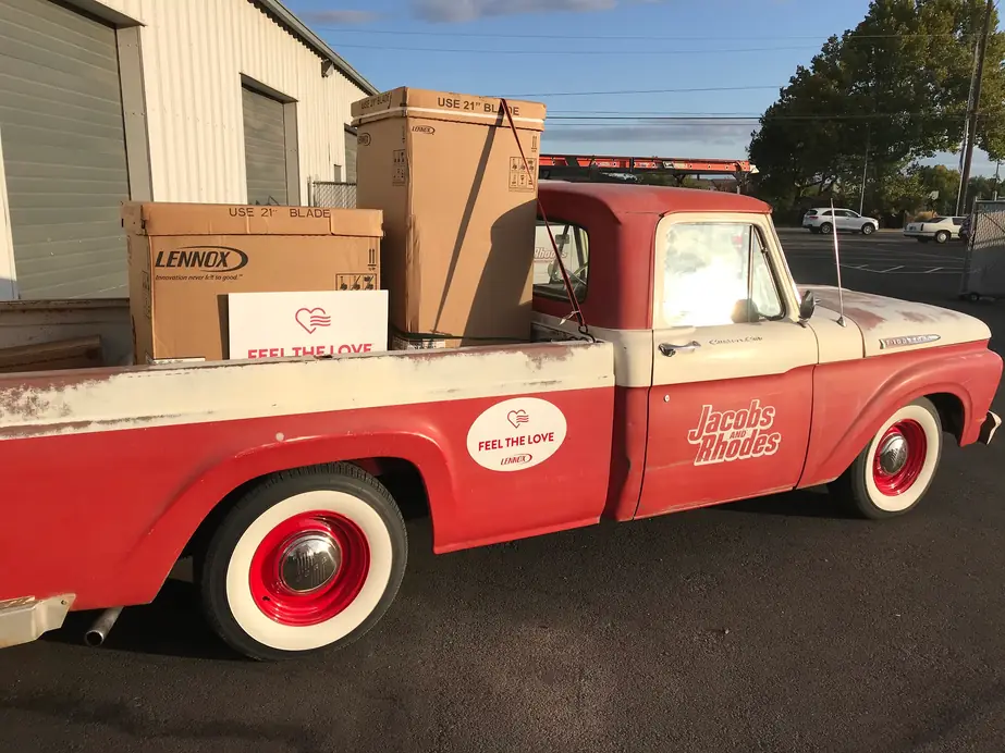Big Red, the company's vintage Ford pickup, loaded with Lennox furnace boxes